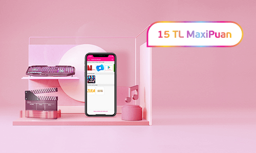 Dijital Kod Market ekranının göründüğü telefon, sinema klaketi, klavye, nota ve 15 TL MaxiPuan