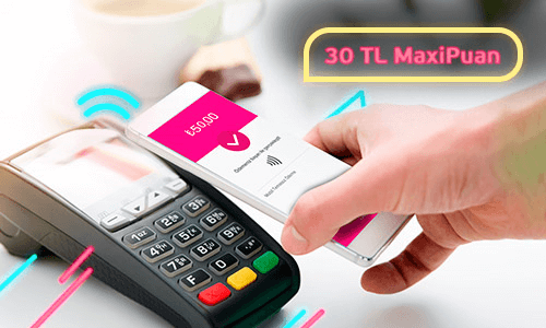 Maximum Mobil ile temassız ödeme yapabilme kampanyasına yönelik POS cihazına uzatılmış telefon